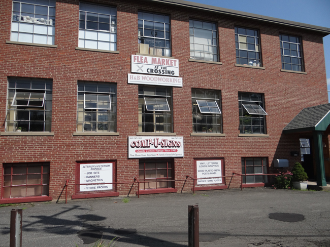 Our flea market occupies the top two floors of an older brick building in Plainville, CT.